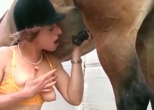 Two big-dicked horses fucking this horny slut