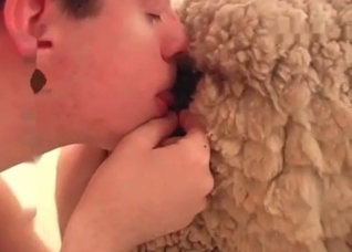 Bestiality banging with a hairy dog cock