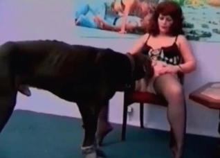 Redheaded zoophile slut gets banged by a dog