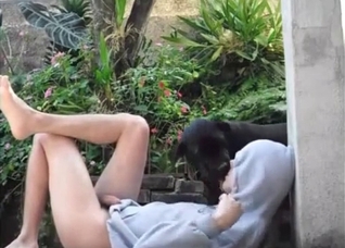 Naked owner with the black, submissive animal