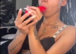 Hot zoo XXX: a black girl sucking a fake cock